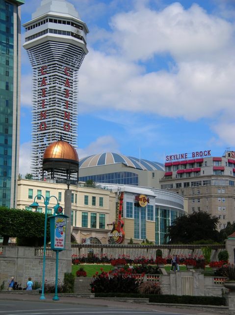 Several buildings and a high tower with Casino in red letters down it.